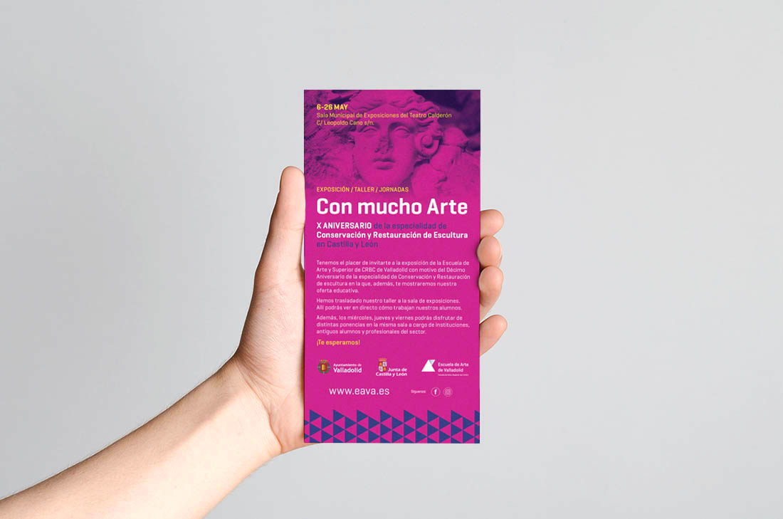 Dl Flyer Mock-Up - Male hands holding a blank flyer on a gray ba